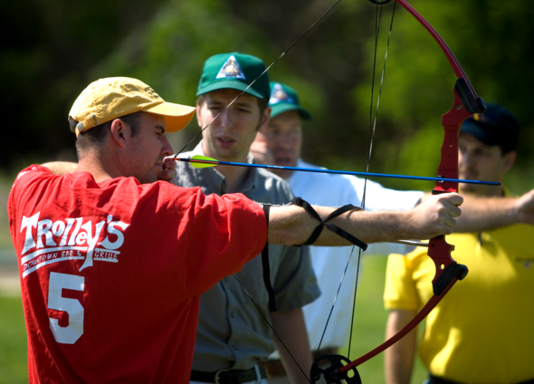 MDC staff give man archery instruction