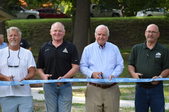 Ribbon cutting at Corby Pond