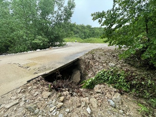 Storm damage to access bridge